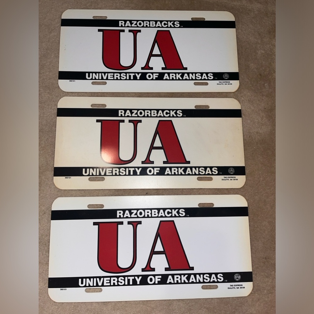 Set of three University of Arkansas license plate / booster plates